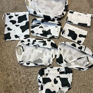 Black & White Cow Print Travel Pouch Set